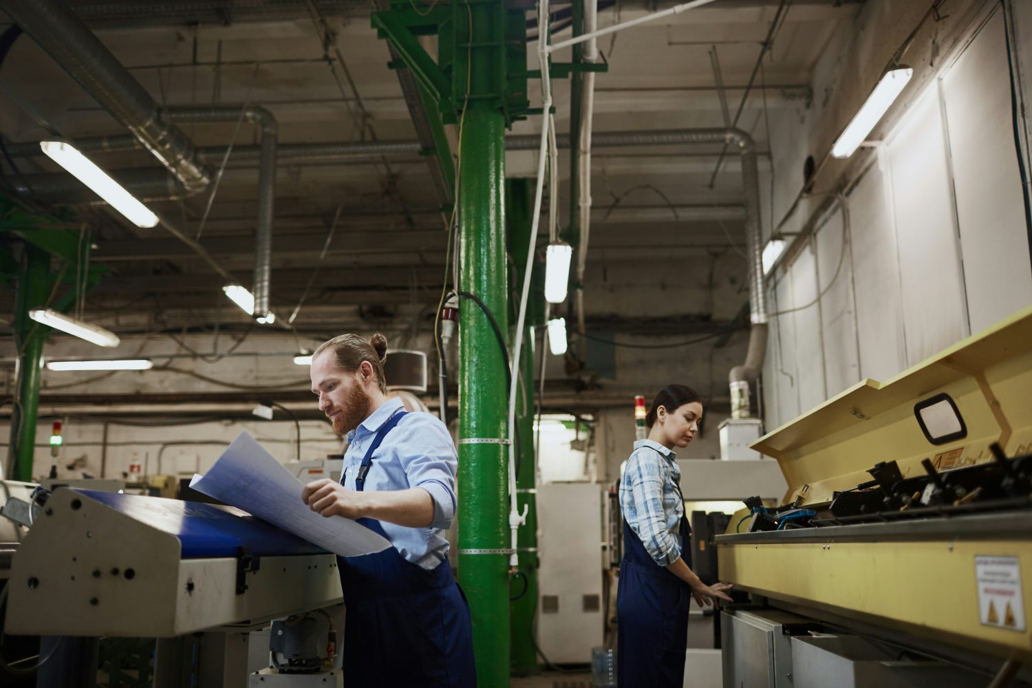 People working in a print facility, one of the areas where callas technology is often used for quality control, correcting PDF files...